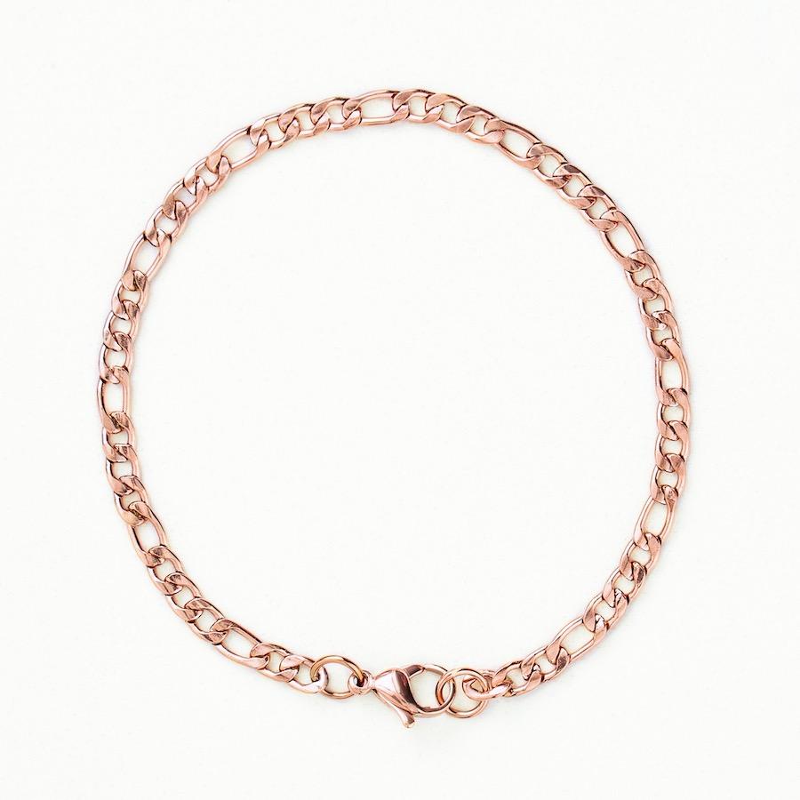 Our Rose Gold Figaro Chain Bracelet features our premium rose gold figaro chain and signature polished rose gold plate, engraved with RG&B.